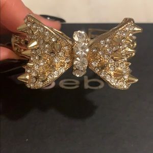Bebe studded bow cuffed bracelet
